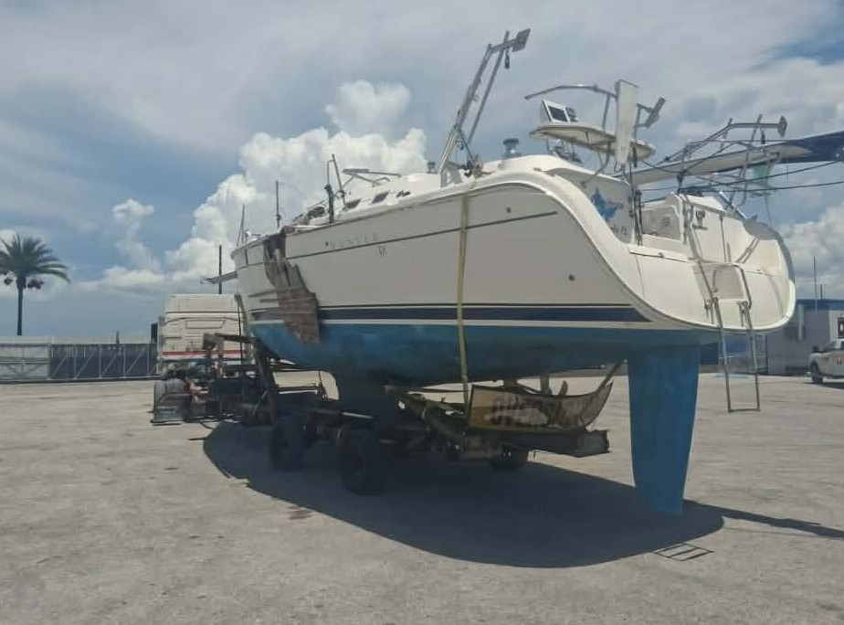 Marine vessel loaded on trailer for transport